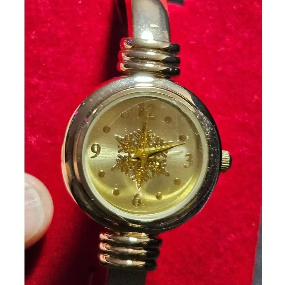 Holiday Lane gold tone snowflake watch